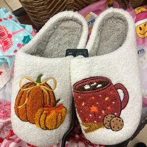 Cozy White Slippers with Pumpkin and Mug Design